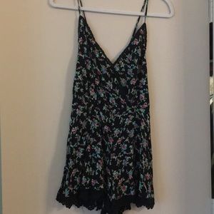 Floral romper, criss cross open back